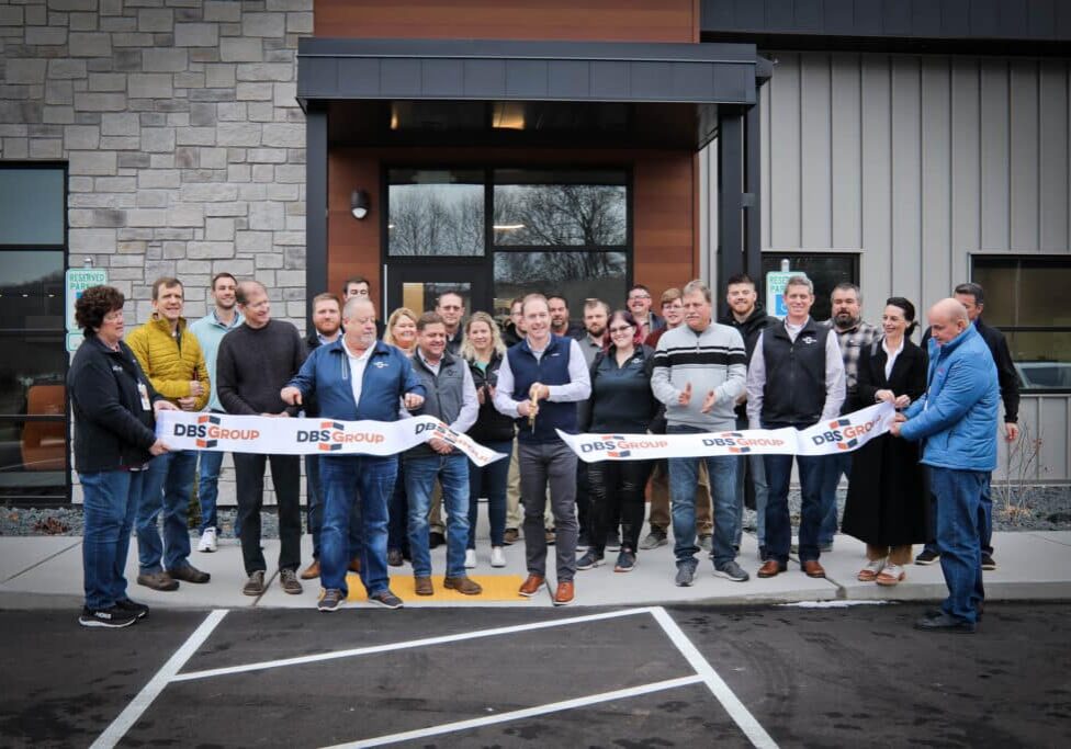 Chris Walters of DBS Group cuts the ribbon on the company's new Onalaska headquarters