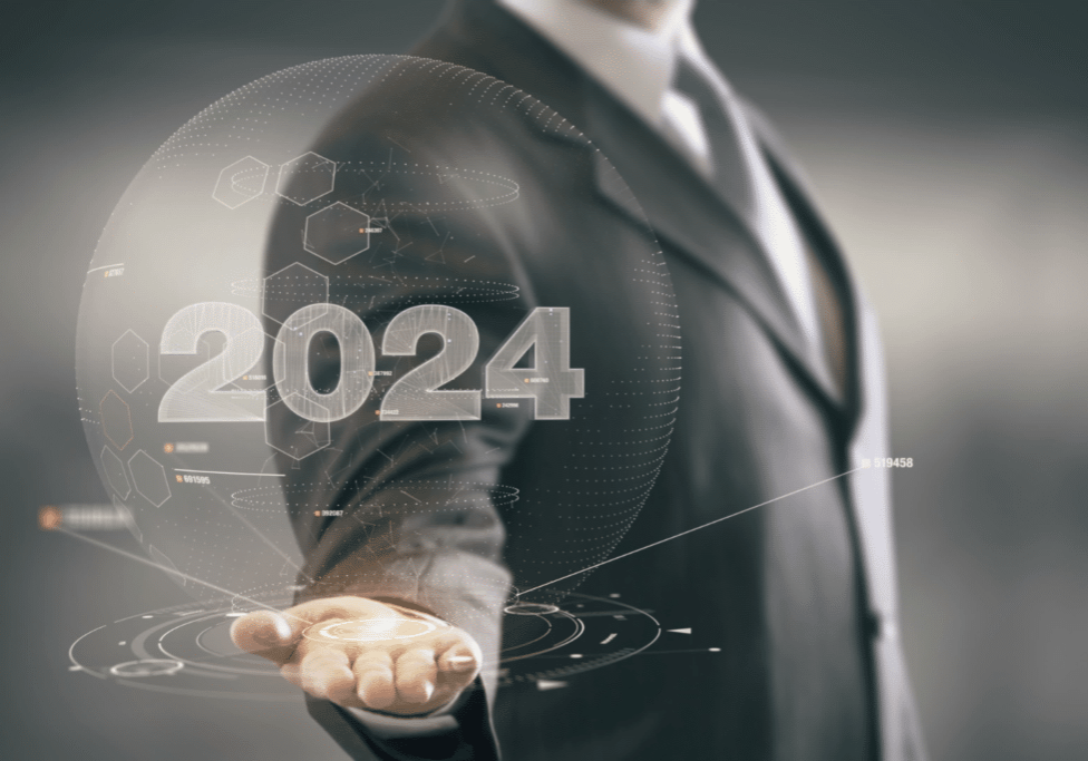 2024 is the year to invest in senior housing is depicted by business man holding holographic image showing 2024 with digital trend indicators.