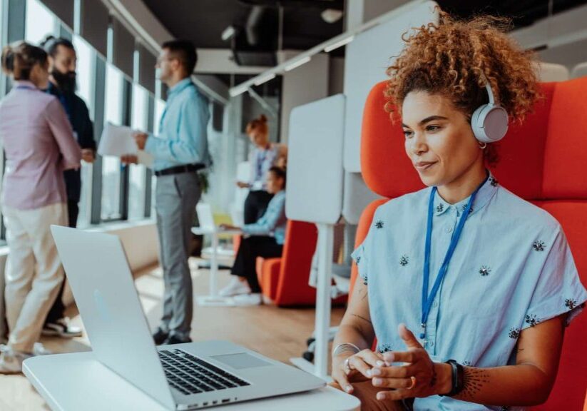 African-American employee using laptop for busines