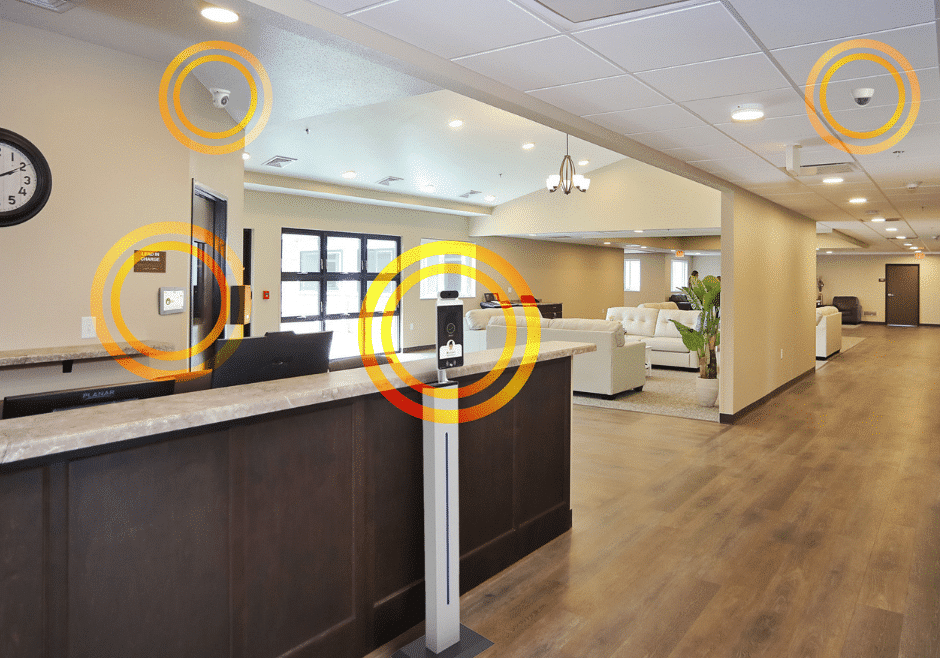Assistive tech for senior living showcased in a photo of a senior living lobby and seating area