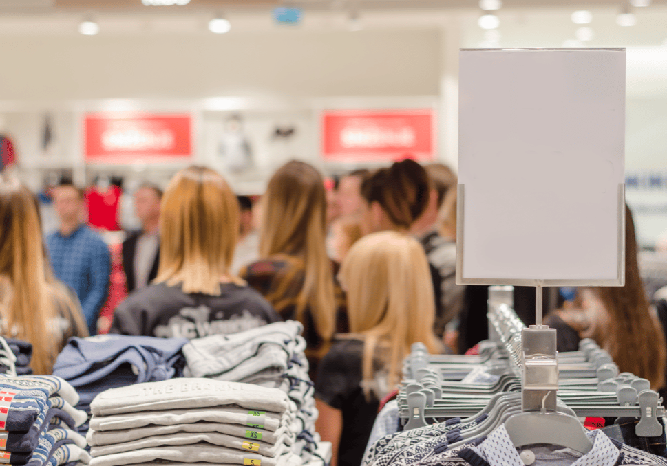 customers waiting in line at crowded store