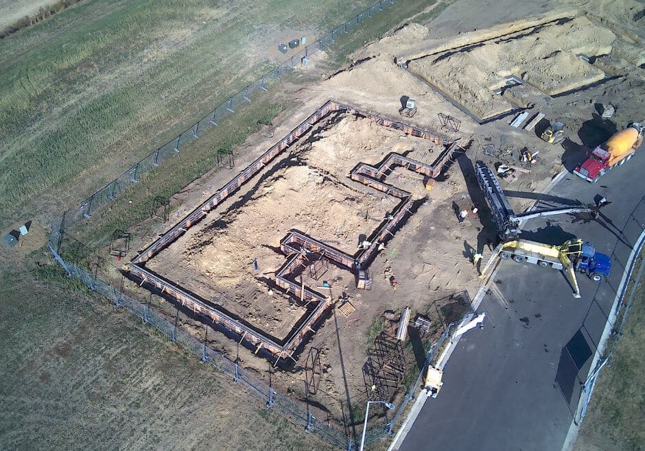 plot of land that's been cleared for a multifamily development.