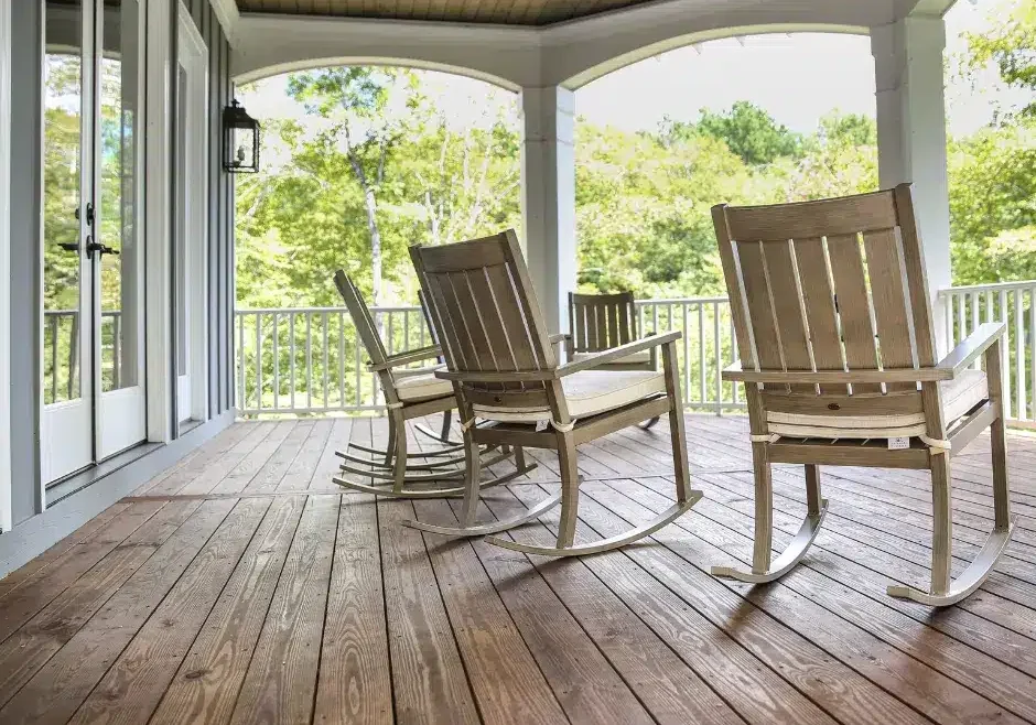 rocking chairs on a covered porch